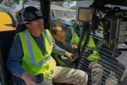Vermeer D24 horizontal directional drill, inside the cab with an operator Vermeer D24 horizontal directional drill, inside the cab with an operator