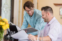 two men sales meeting two men sales meeting