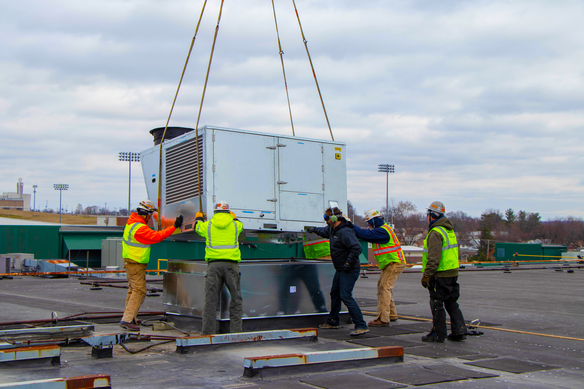 IFS crew lowers unit into place