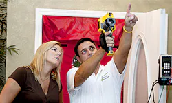 Advance Energy Auditor is testing the energy performance of a home Advance Energy Auditor is testing the energy performance of a home