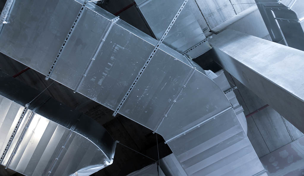 A crisscrossing of ductwork in an HVAC system makes for interesting artwork