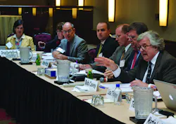 Danfoss Symposium moderator Robert Cavey right said the refrigeration industry is facing interesting challenges ldquoThe only way it will work is if the people in this industry all put their oars in the waterrdquo he said Danfoss Symposium moderator Robert Cavey right said the refrigeration industry is facing interesting challenges ldquoThe only way it will work is if the people in this industry all put their oars in the waterrdquo he said