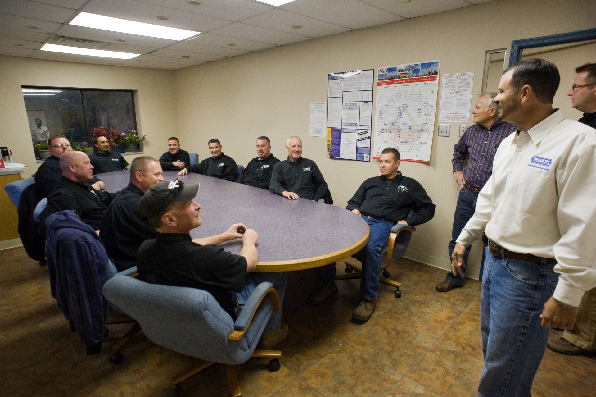 Work the room A meeting at Travers Mechanical Services Albuquerque NM A service manager must be able to listen to many voicesPhoto by John Vastyan