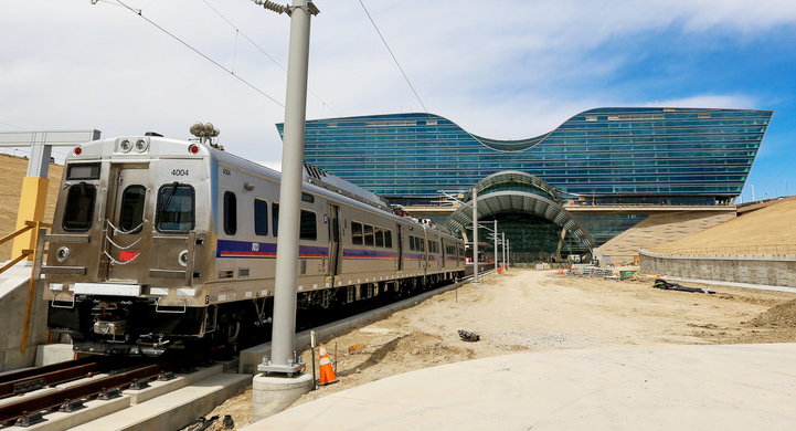 A train makes its way into the new Transit Center beneath the Westin Hotel The hotel was designed this way because the airport needed at least 500 rooms for the hotel to be financially viable but it can only be so high due to FAA limitations and can only be so wide because there are roads on both sides A plan was devised to build a hotel that might have an odd shape but had enough space for what turned out to be 519 guest rooms plus a convention center transit center and plazaPhotos courtesy Burgess Servic