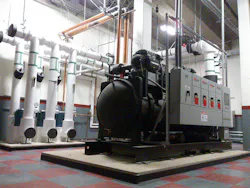 The engineer suggested replacing the screw chillers with a standard watercooled centrifugal chiller and replacing the evaporative condensers with cooling towers Ten or 12in diameter piping and pumps would circulate condenser water from the basement to the rooftop The engineer suggested replacing the screw chillers with a standard watercooled centrifugal chiller and replacing the evaporative condensers with cooling towers Ten or 12in diameter piping and pumps would circulate condenser water from the basement to the rooftop