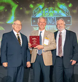 Ken Dean, center, Dean Heating and Cooling, NCI Small Contractor of the Year. Ken Dean, center, Dean Heating and Cooling, NCI Small Contractor of the Year.