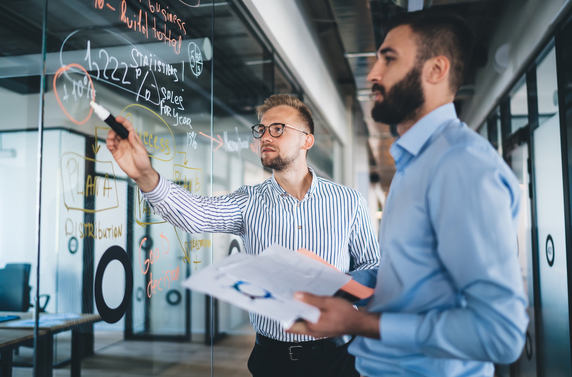 Men Diagraming A Plan I Stock 1438456638 65326d4e8971e