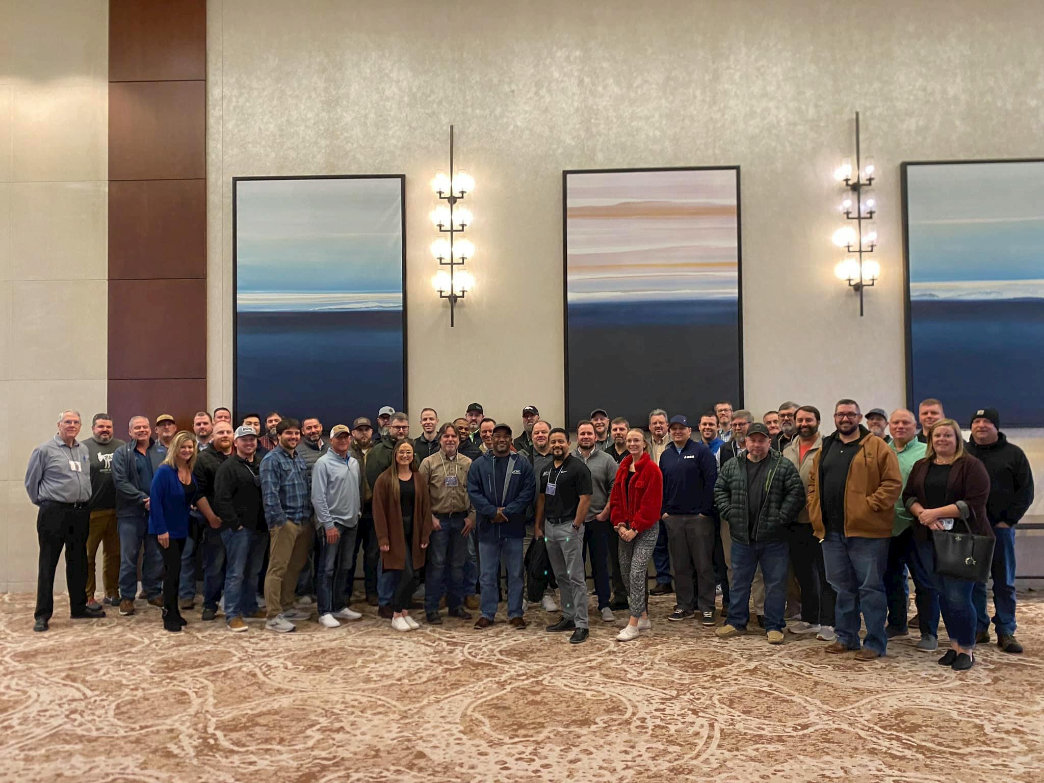 65d7a4af4b1d51001e7916b5 Service Management Group Photo