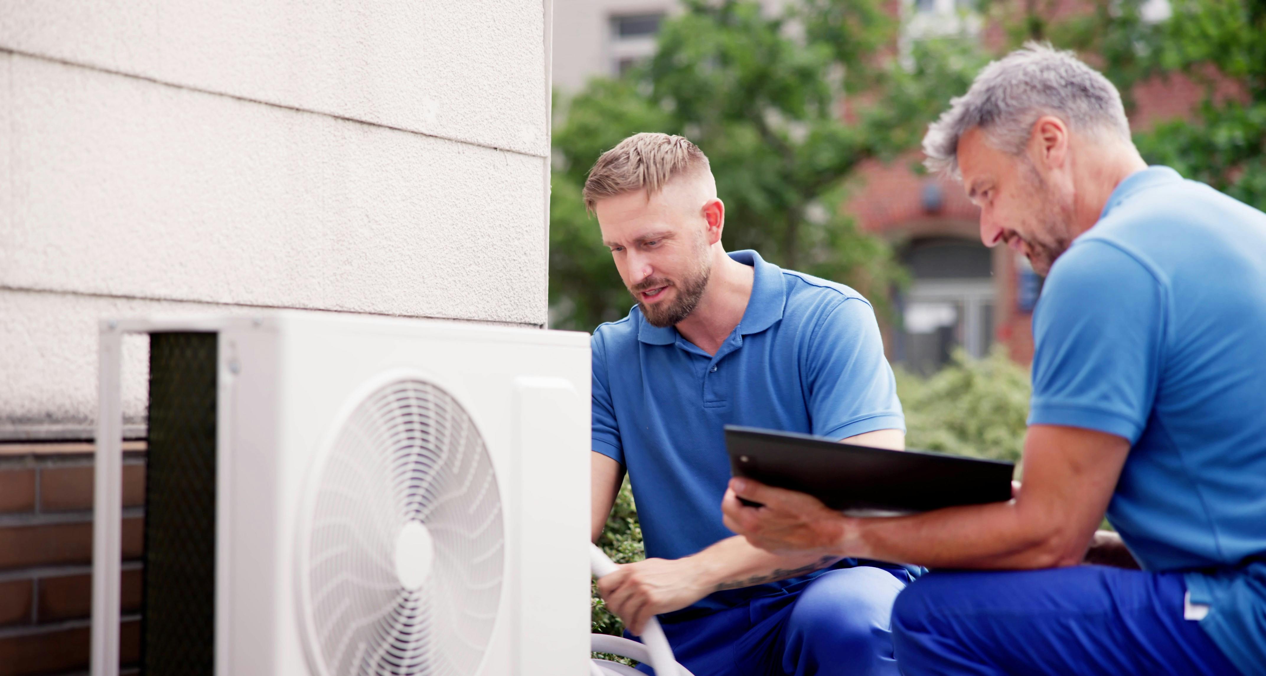 65fcc9630e3f19001ebbbe3d Two Working On Hvac