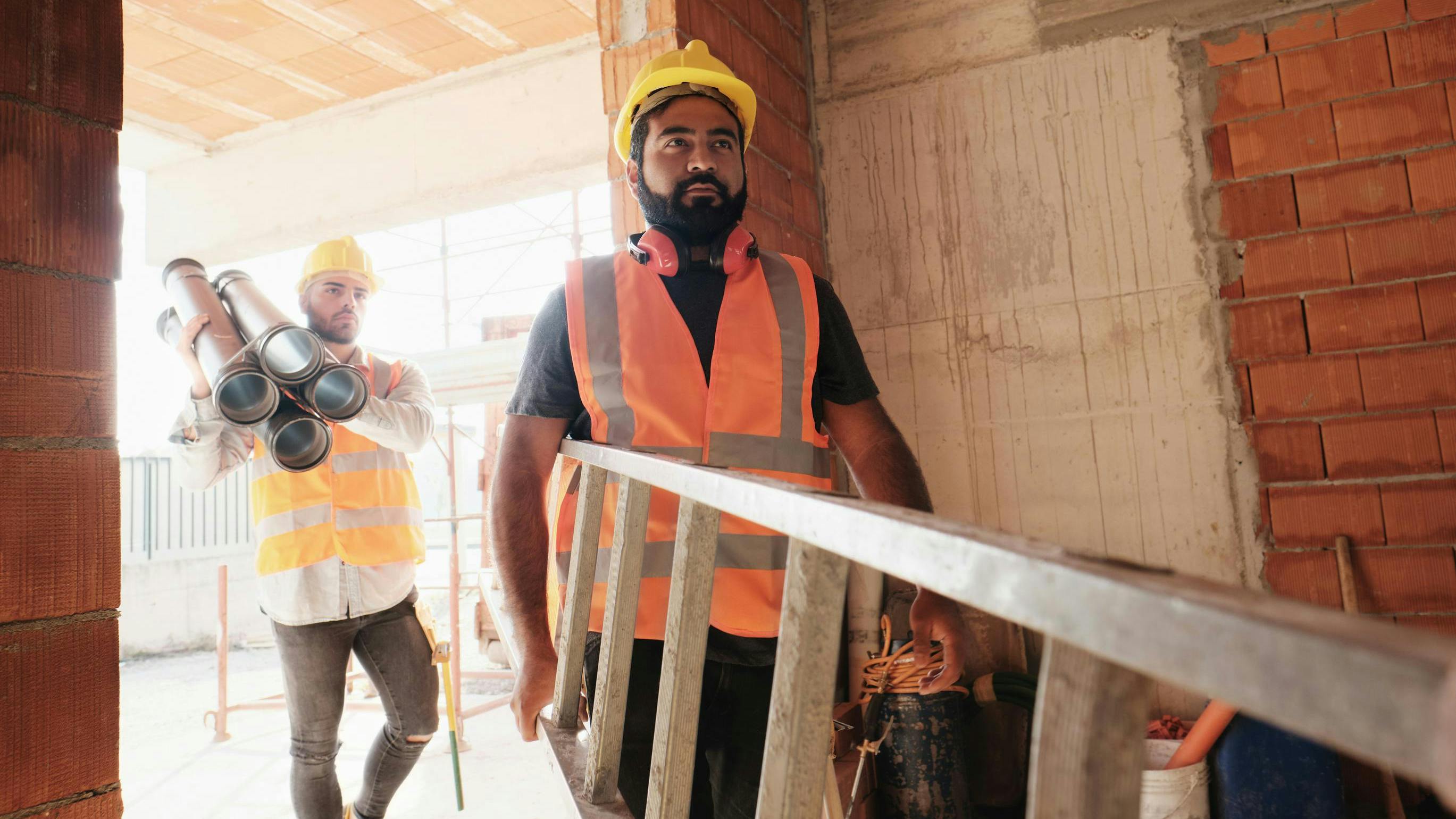 6606ed3c704ecf001e3cec8c Construction Workers Dreamstime L 134996491
