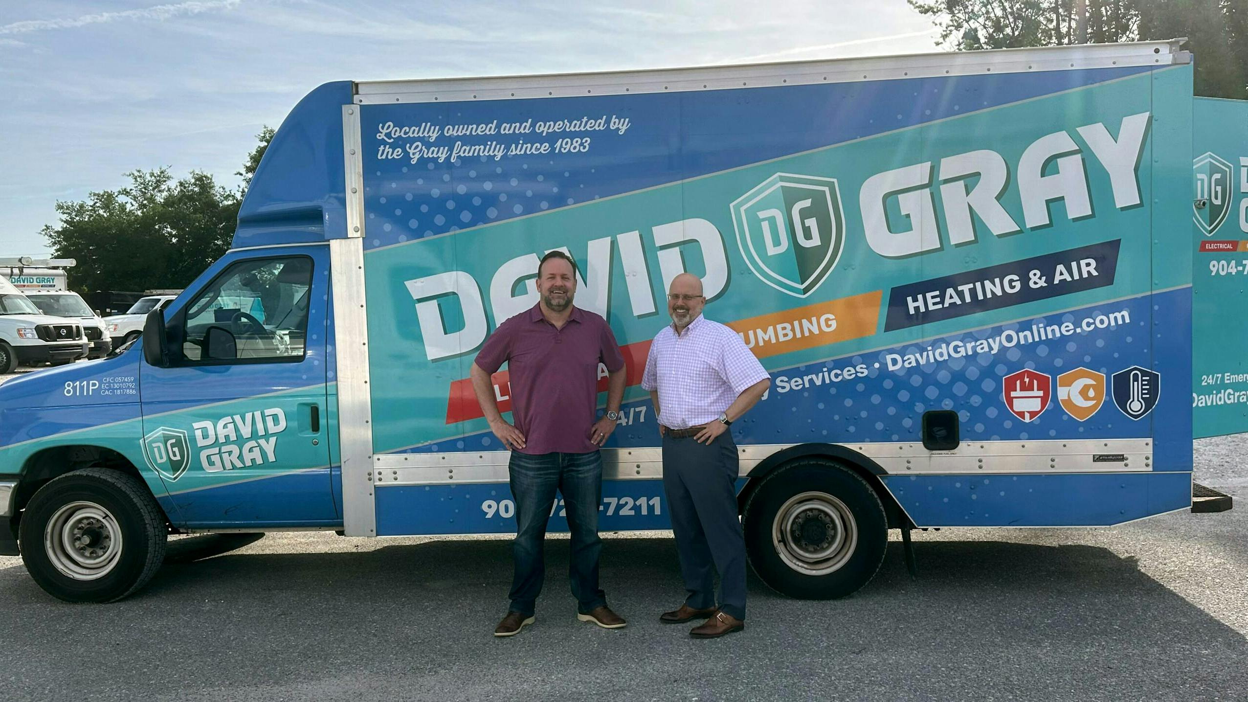 Gary Gray, left, owner of David Gray, with Southern Home Services CEO Bryan Benak.