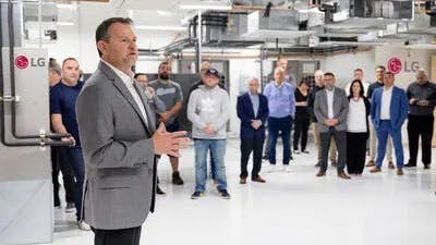 Steve Scarbrough, Senior Vice President, Air Conditioning Technologies for LG Electronics, USA, speaks to guests during the opening of the newest LG Academy in Boston, MA.