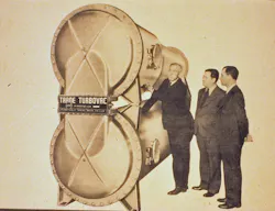 Reuben Trane, pictured with two other men, stands next to the Trane TurboVac chiller. Reuben Trane, pictured with two other men, stands next to the Trane TurboVac chiller.