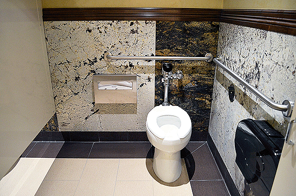 Gas station guests are treated to granite and marble Flush valves are from Sloan