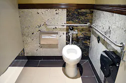 Gas station guests are treated to granite and marble Flush valves are from Sloan Gas station guests are treated to granite and marble Flush valves are from Sloan