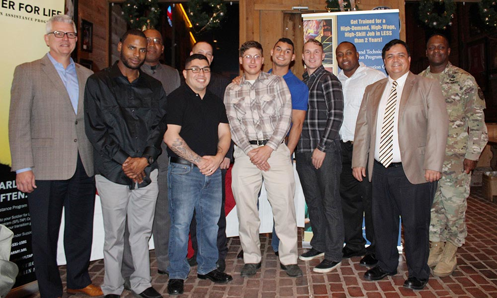 A group of newlycredentialed vets