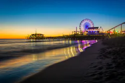 The Santa Monica Pier at sunset. The Santa Monica Pier at sunset.