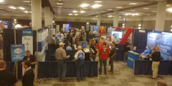 The event featured several rows of exhibitors. The event featured several rows of exhibitors.