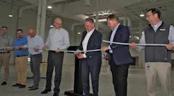 Michael Rauterkus, president and CEO, Uponor Group, (center) joins business leaders as he cuts the ceremonial PEX-a pipe to mark the opening of the company’s $5.5 million, 25,000 sq. ft. expansion in Hutchinson, Minn. Michael Rauterkus, president and CEO, Uponor Group, (center) joins business leaders as he cuts the ceremonial PEX-a pipe to mark the opening of the company’s $5.5 million, 25,000 sq. ft. expansion in Hutchinson, Minn.