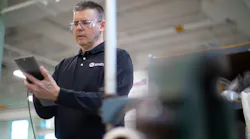 A quality control worker on the line at an A. O. Smith manufacturing facility. A quality control worker on the line at an A. O. Smith manufacturing facility.