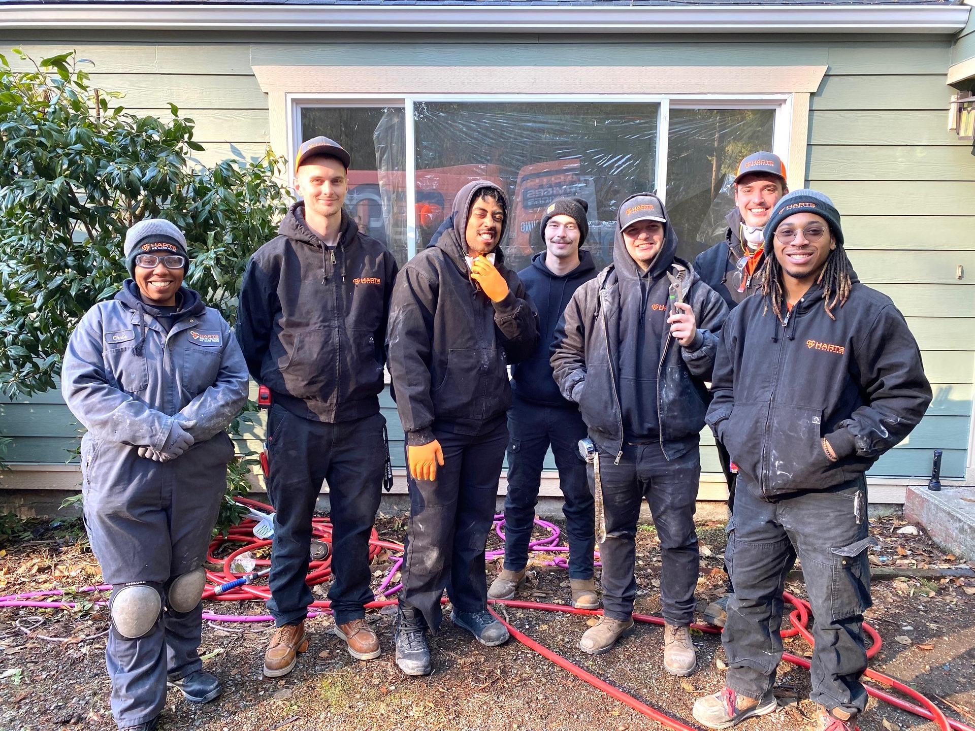 The seven-member crew from Harts Services' innovative in-house apprenticeship program.