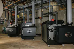 Three HTP Enduro Ti 750 MBH boilers in the mechanical room at Greenwich Catholic School. Three HTP Enduro Ti 750 MBH boilers in the mechanical room at Greenwich Catholic School.