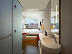 A modular bathroom with a view at the citizenM Bowery Hotel. A modular bathroom with a view at the citizenM Bowery Hotel.