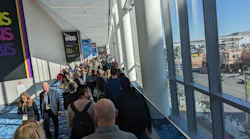 Crowds walk the long passage between W hall and N halls at Design and Construction Week. Crowds walk the long passage between W hall and N halls at Design and Construction Week.