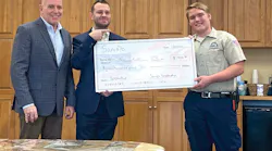 John Glass and Rob Weed of Saniflo SFA attended to congratulate Thomas on the award. John Glass and Rob Weed of Saniflo SFA attended to congratulate Thomas on the award.