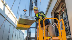 An AZCO technician loading up industrial batteries. The company has made significant investments in its electrical work. An AZCO technician loading up industrial batteries. The company has made significant investments in its electrical work.