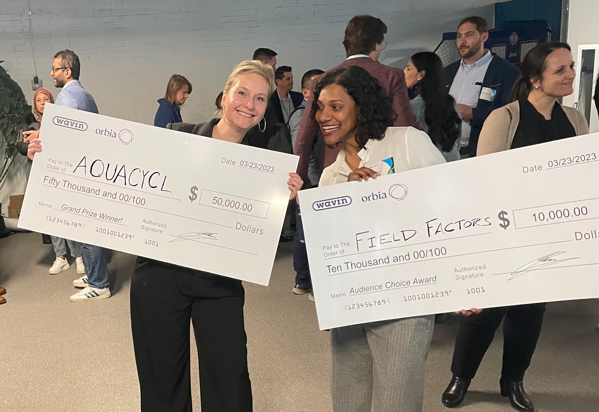 Left to right: Aquacycl founder Orianna Bretschger and Karina Pena, co-founder and CEO of Field Factors, winners of the Audience Choice Award.