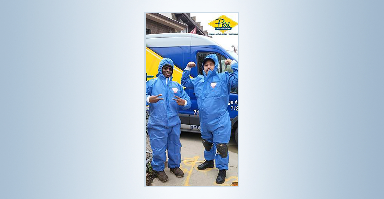 Left, Jean Edmond, three-year apprentice. Right, William Rivera, 30-year plumber.