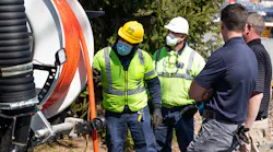 Workers wearing their PPE at the vacuum truck. To prevent free spooling the nozzle up the line and losing control, use a nozzle skid and hold the nozzle back. Workers wearing their PPE at the vacuum truck. To prevent free spooling the nozzle up the line and losing control, use a nozzle skid and hold the nozzle back.