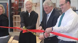 Opening ceremonies with Douglas Green doing the ribbon cutting. He is flanked on his right by his wife, Heather and on his left by Daniel Orrantia, Principle of the Evergreen School. Opening ceremonies with Douglas Green doing the ribbon cutting. He is flanked on his right by his wife, Heather and on his left by Daniel Orrantia, Principle of the Evergreen School.
