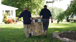 Transporting the ProLine® XE Tankless Condensing Gas Water Heater to the mechanical room. Transporting the ProLine® XE Tankless Condensing Gas Water Heater to the mechanical room.