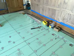 The PEX tubing required nail plates spaced one foot apart. The PEX tubing required nail plates spaced one foot apart.