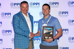 Jason Ahrenholz of Prinsco (right), receives the Project of the Year Award for the association’s Drainage Division from PPI President David Fink. Jason Ahrenholz of Prinsco (right), receives the Project of the Year Award for the association’s Drainage Division from PPI President David Fink.