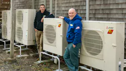 Dave Sprague and Brian Nelson with heat pumps. Dave Sprague and Brian Nelson with heat pumps.