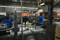 Merit Brass CEO Alan Lipp gave Dirk Beveridge a tour of the Merit Brass manufacturing facility. Merit Brass CEO Alan Lipp gave Dirk Beveridge a tour of the Merit Brass manufacturing facility.