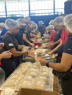 Rheem Employees assembling 9/11 Meal Packs. Rheem Employees assembling 9/11 Meal Packs.