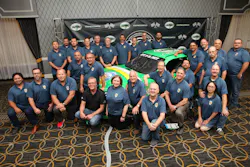 An IAPMO chapter posing with a racecar at the 94th Education and Business Conference. An IAPMO chapter posing with a racecar at the 94th Education and Business Conference.