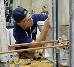 Hard at work during the plumbing apprentice competition. Hard at work during the plumbing apprentice competition.