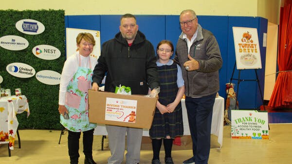 Bradford White Corporation sponsors Ron Jaworski&rsquo;s (pictured, right) Jaws Youth Playbook Turkey Drive along with other charities in Pennsylvania and Michigan to support the fight against hunger this Thanksgiving.