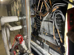 Leaking refrigerant connections between sections. Leaking refrigerant connections between sections.