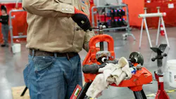 A competitor in the Pipe Joining competition at the 2025 National Craft Championships. A competitor in the Pipe Joining competition at the 2025 National Craft Championships.