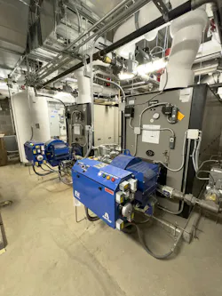 Two QAS fired boilers in the basement of the addition space. Two QAS fired boilers in the basement of the addition space.