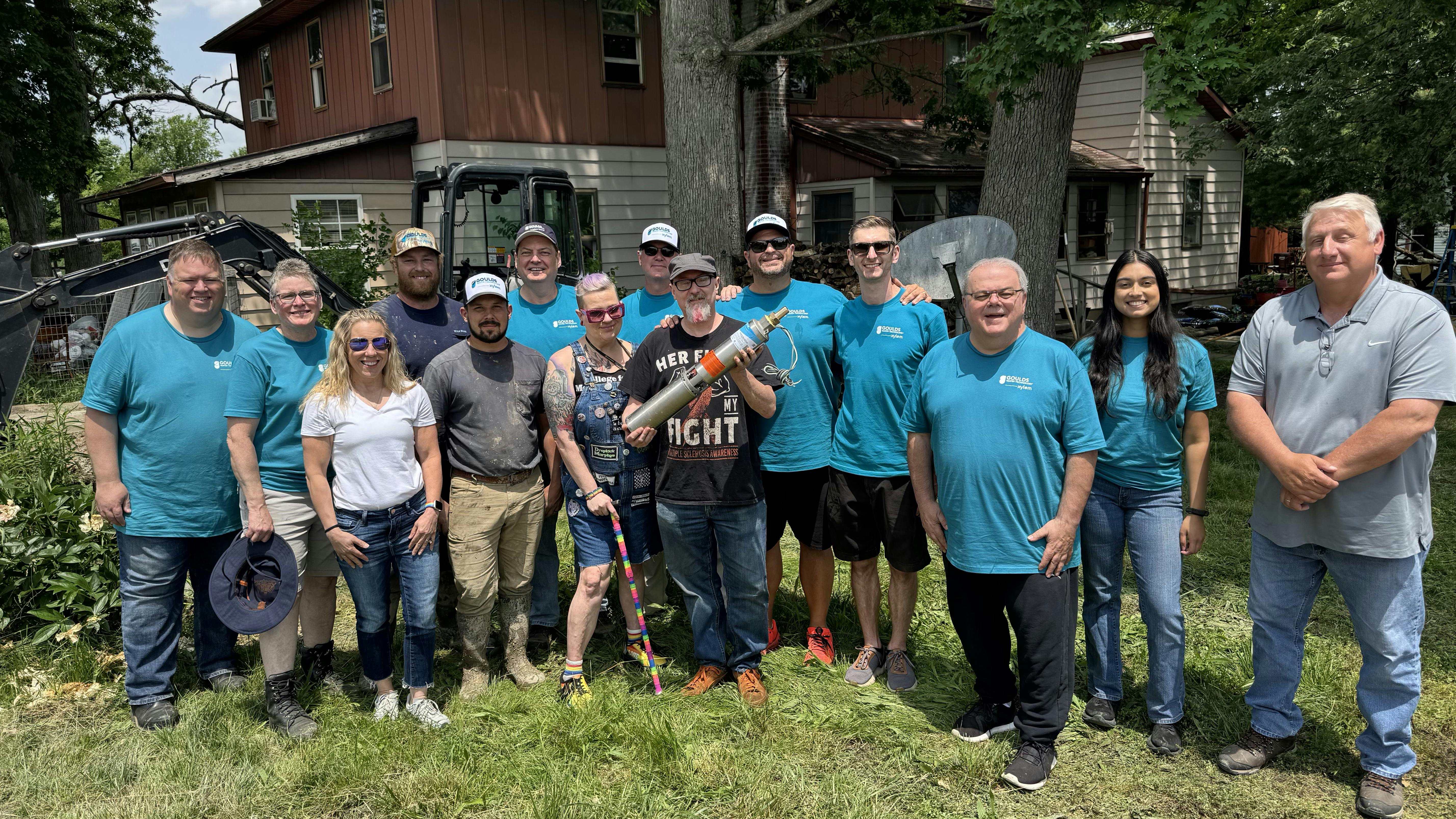 Volunteers from the Water Well Trust (WWT) and HometownH2O along with members of the Olsen family.