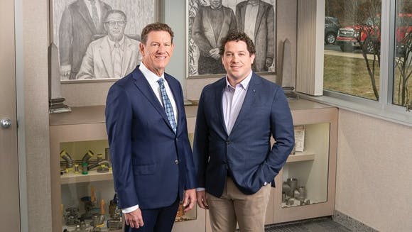 Merit Brass' Alan Lipp (left) and his son, Kevin.