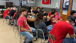 Working in the classroom. Working in the classroom.