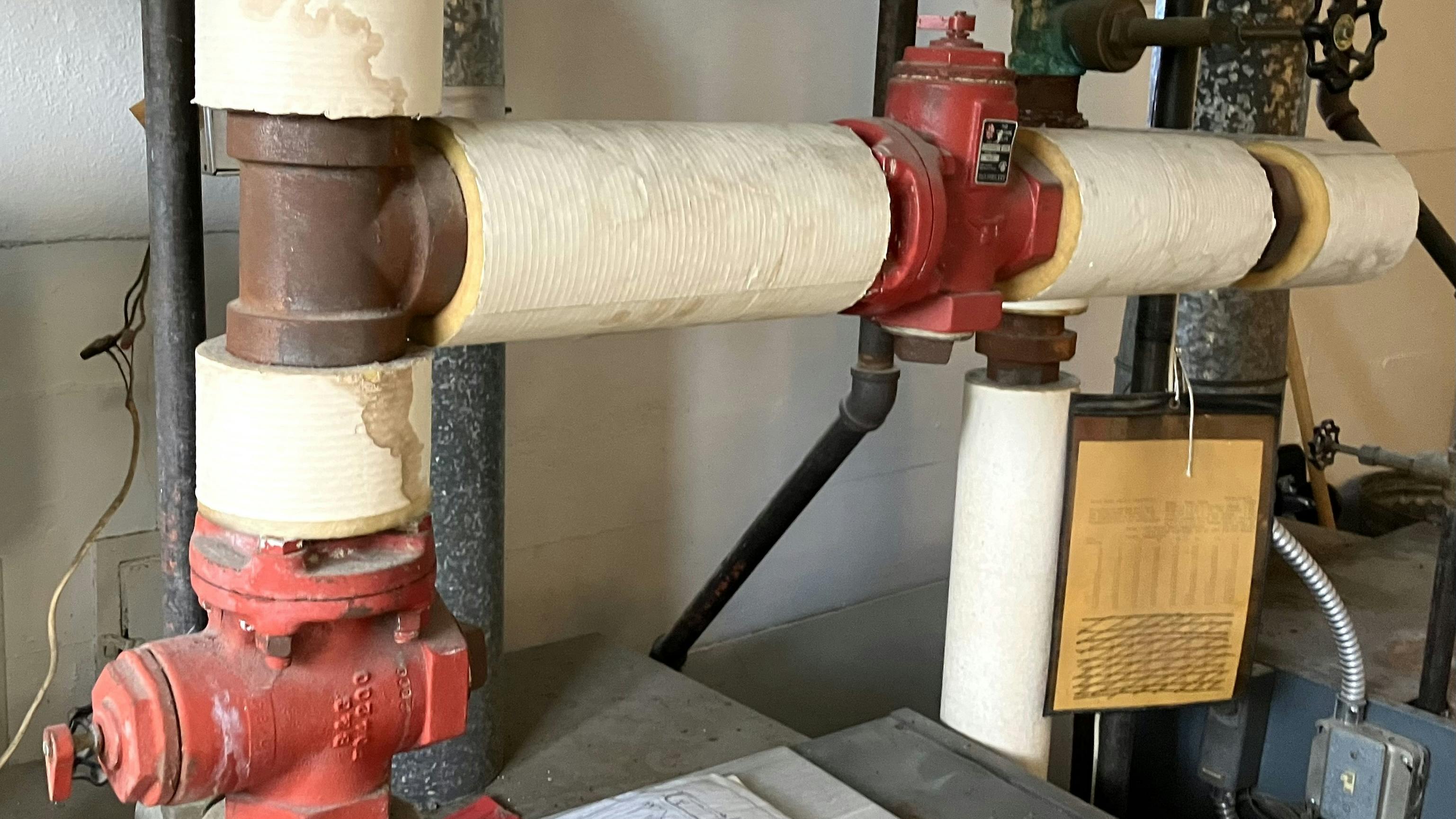 The red valves only allow water to flow in one direction.